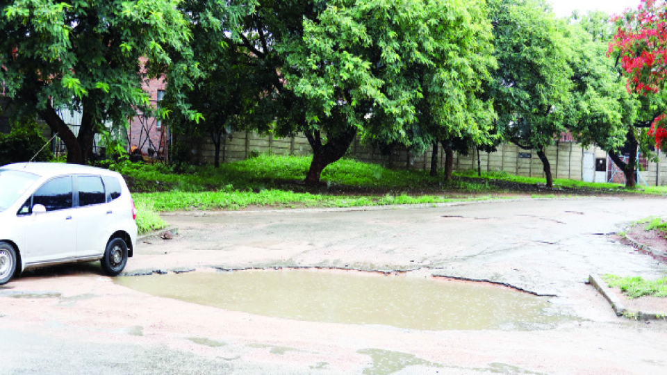 Rains pound road infrastructure…potholes re-emerge in wake of recent showers
