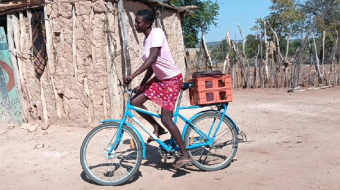 Young farmer cycles 7km for sustainable harvest