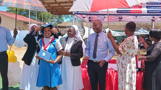 Sacred Heart Primary School celebrates student achievements, emphasizes role of family and community in nurturing future generations